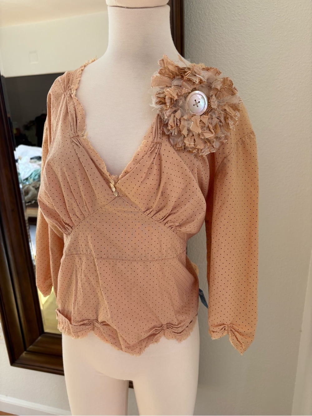 Blush Dot-Print V-Neck Blouse with Floral Shoulder Detail